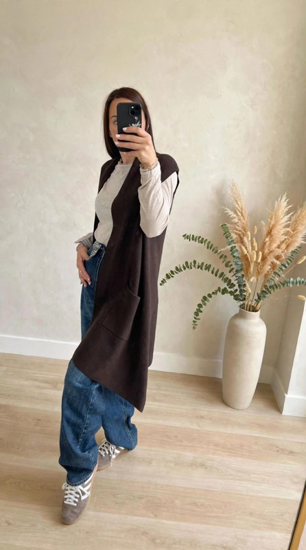 Gilet lungo tasche